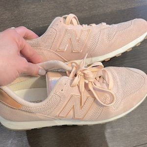 Light pink suede New Balance sneakers